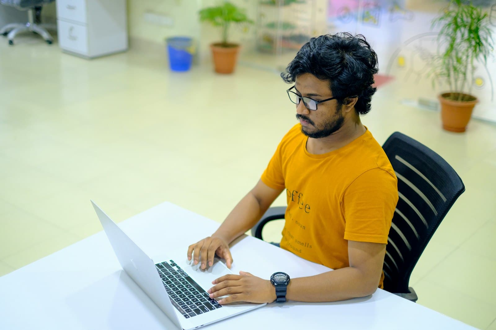 Desk worker doing a chin tuck at their workstation